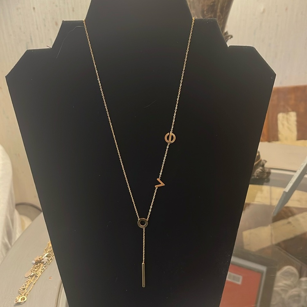 18k gold LOVE necklace. 16 in